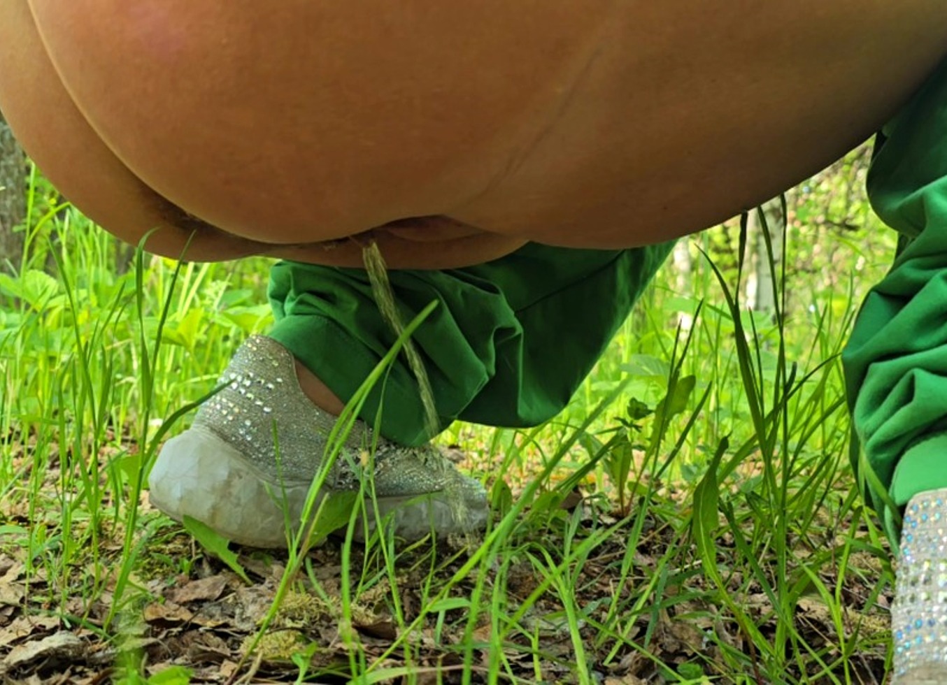 Mature MILF Pisses In Nature And Masturbates Sitting On A Tree Stump