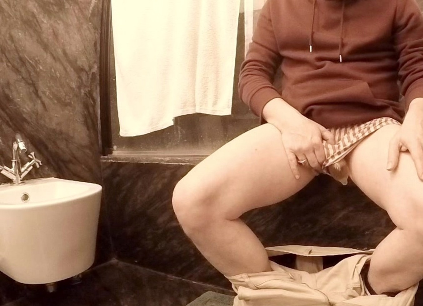 Guy Peeing In A Condom In The Bathroom... Fail! (Piss Spills Everywhere When He Takes It Off :P)
