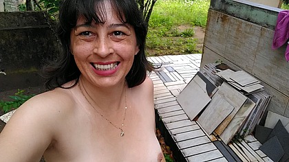 Wife walking around naked outside. She pees and touches herself.