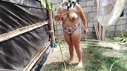 Amazing horny stepmom bathes in a lonely place and touches her pussy very richly.