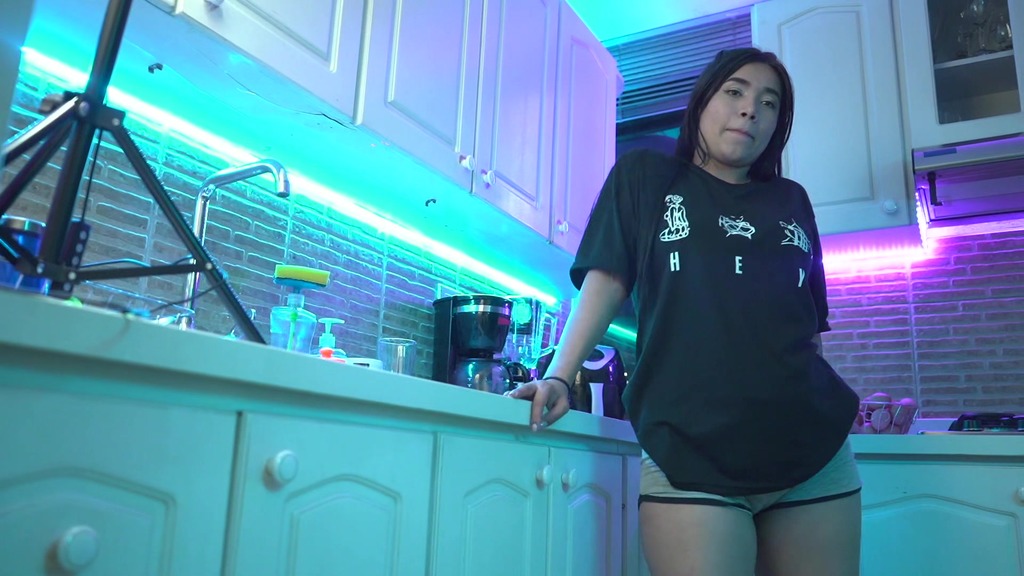 dancing at the kitchen on a streptease