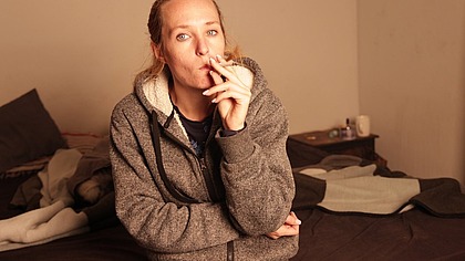 Smoking and Staring at the Camera