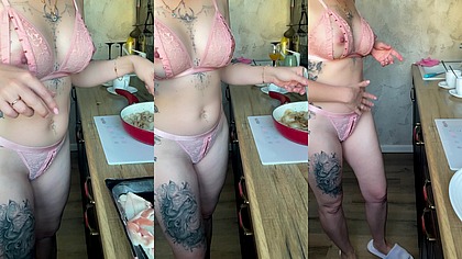 Beautiful naked wife cooking breakfast