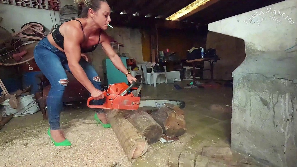 smoking while revving a chainsaw (Paula Mancini) smoking while revving a chainsaw (Paula Mancini)