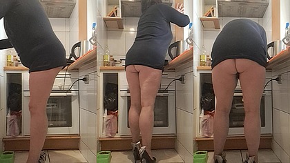 in the kitchen in heels