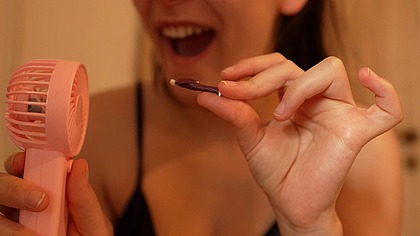 A giantess wife humiliates and taunts her tiny husband, mocking him because he has a small cock.