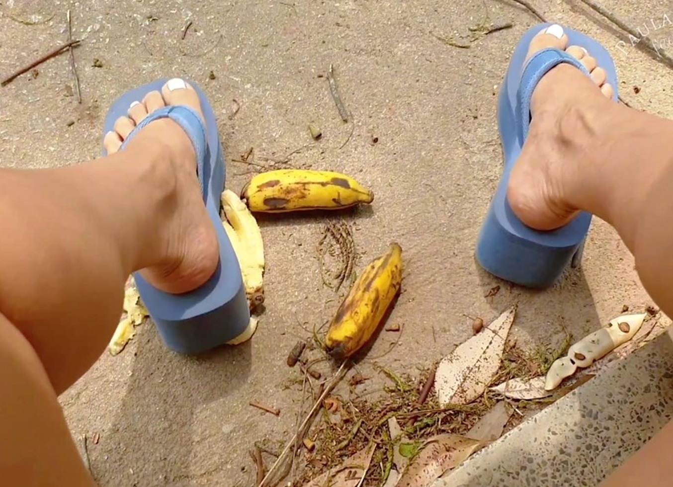 Crushing Fruit In Big Flipflops
