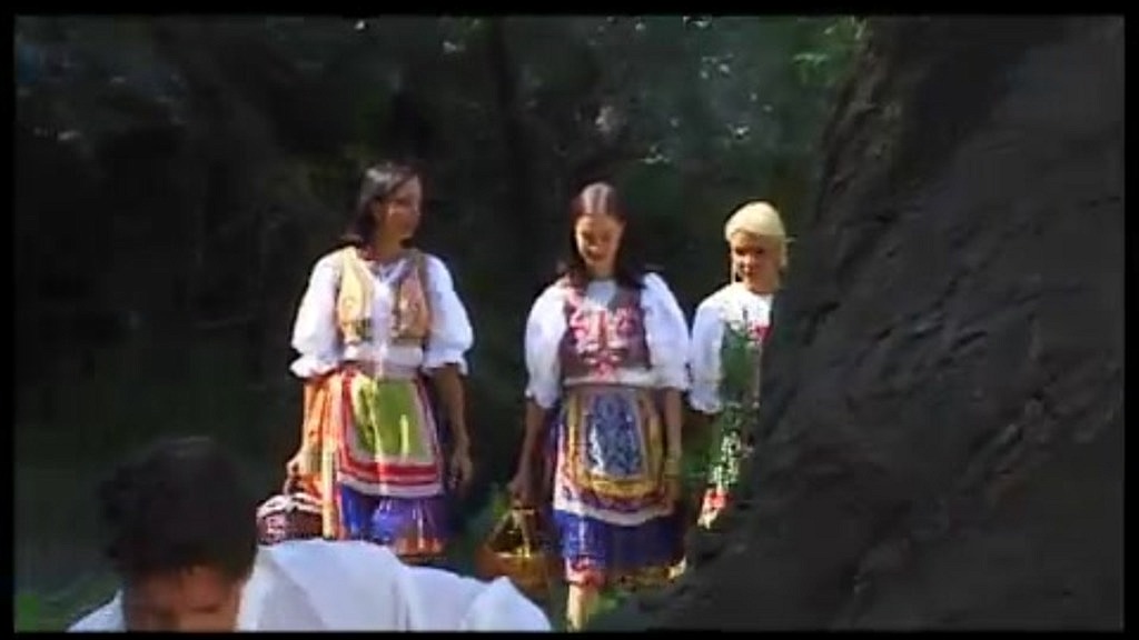 Three sexy girls seduce a lone man while bathing in a lake