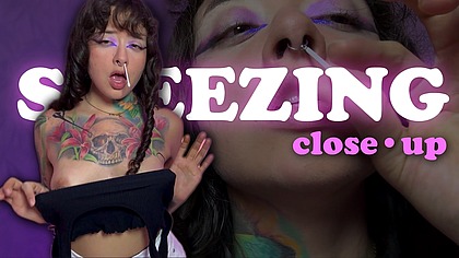 Loud, wet sneezes. Close-up.