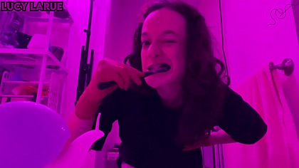 "PINK Brushing Teeth Wearing Burgundy Nitrile Gloves"