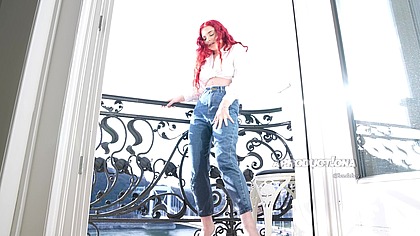 Wetting jeans and smoking on balcony