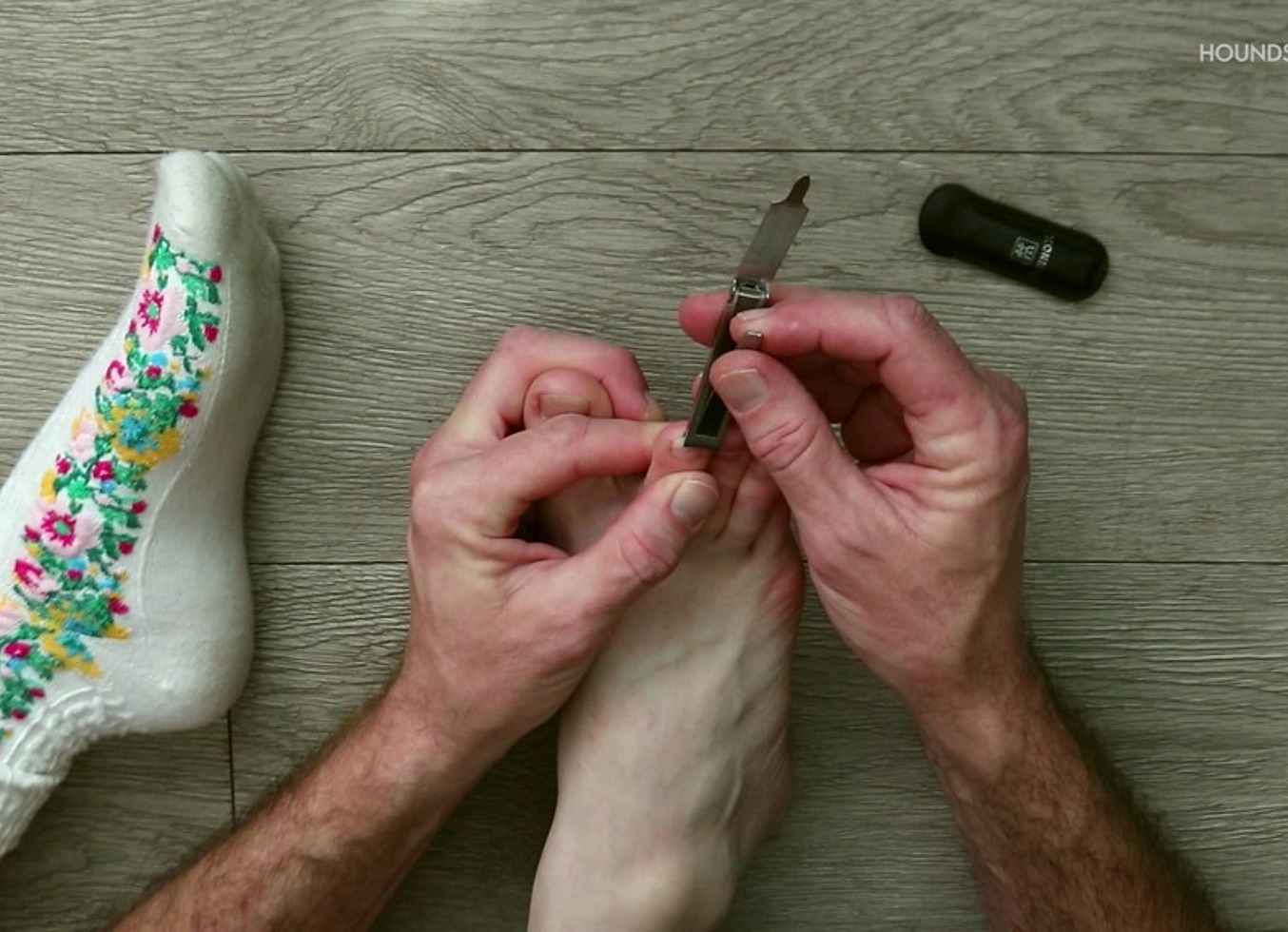 Older Hands Trim Little Toenails