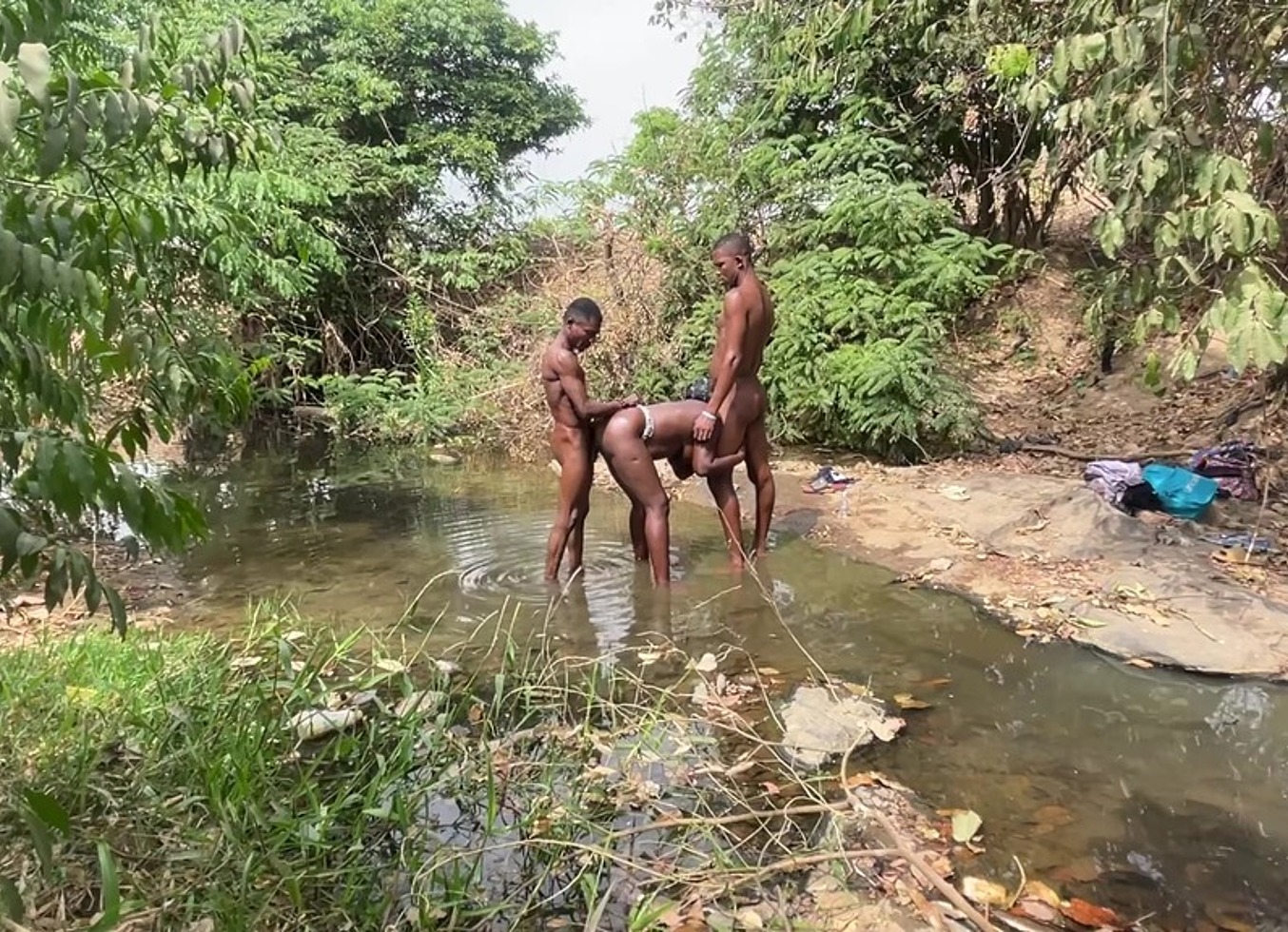 Threesome By The Riverside