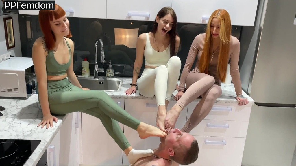 group foot worship femdom - one slave serves the bare feet of three mistresses