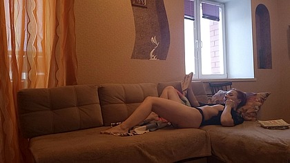 Reading a romance makes her wet