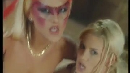 Two Stunning Blondes in Crazy Makeup Share a Huge Cock