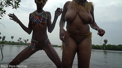 I encounter 2 naked tribe girls dancing and playing in the river