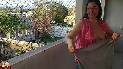 I taped my wife showing her tits on the balcony for delivery guys