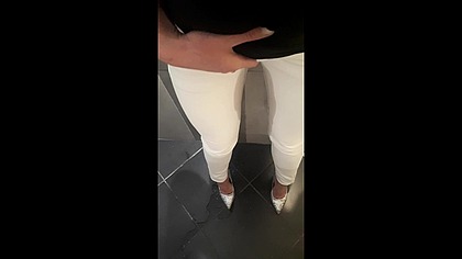 Desperate Pee in White Jeans and HighHeels