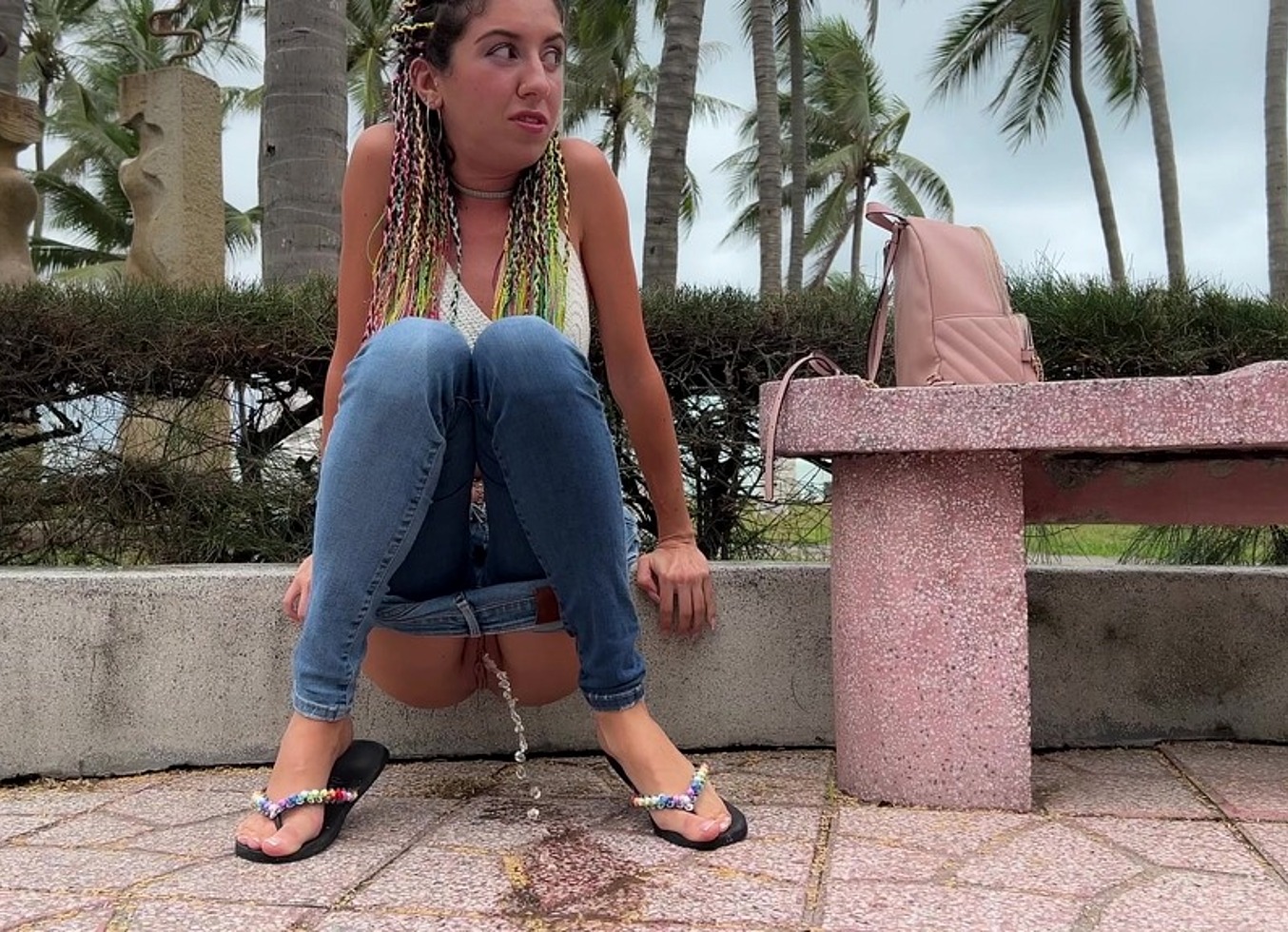 Public Wetting Jeans In Park Near The Beach