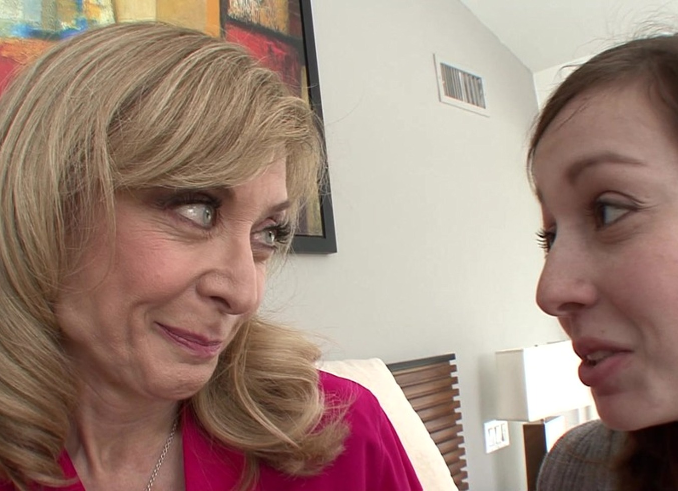 Ally Evans Is Seduced By MILF Nina Hartley to Learn How to Lick Pussy.