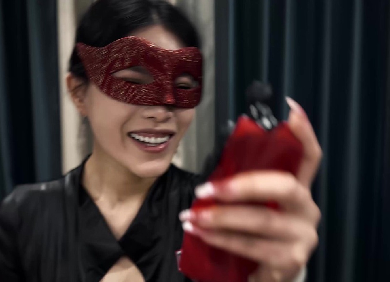 Batman Under Catwoman's Feet