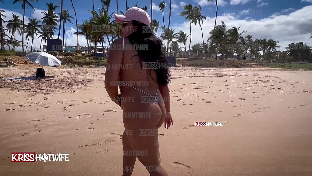 kriss on a public beach wearing a clear bikini (Kriss hotwife) kriss on a public beach wearing a clear bikini (Kriss hotwife)