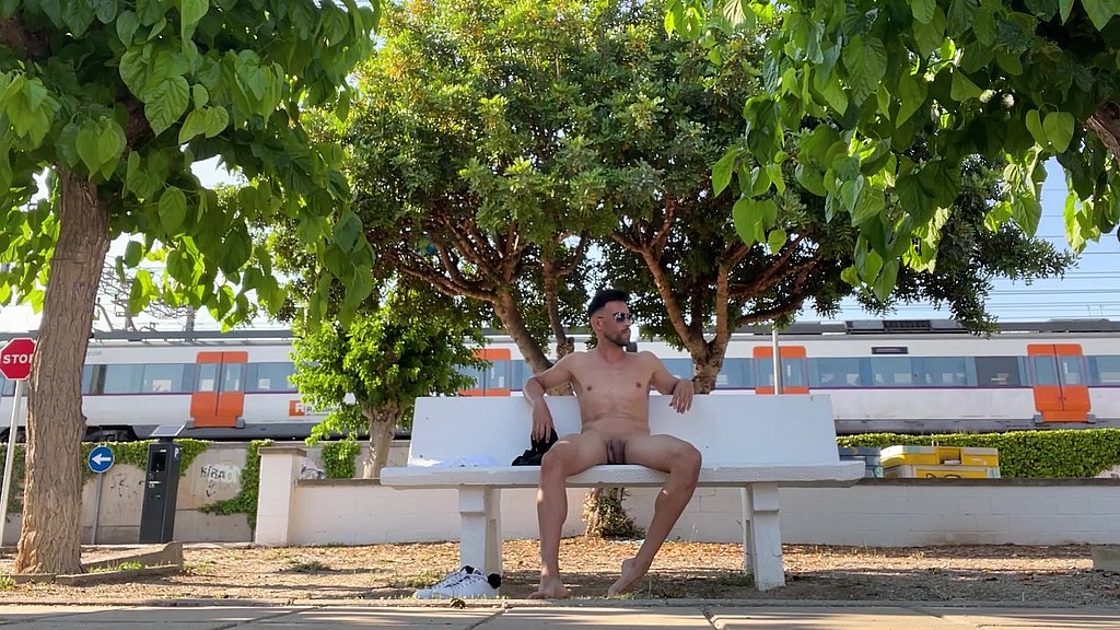 fully naked on a park bench while train is passing by (Paul Williams) fully naked on a park bench while train is passing by (Paul Williams)