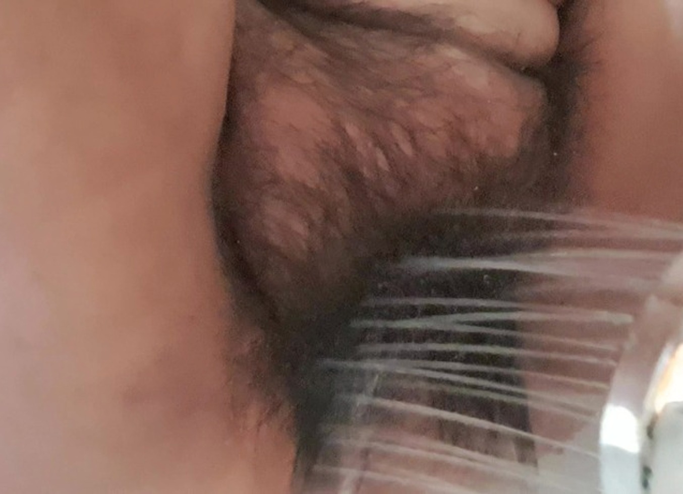 MILF Dripping Water On Her Hairy Vagina