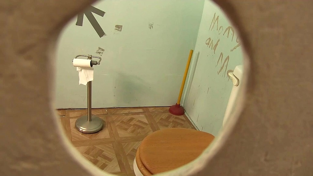 jamie jackson gives a wet blowjob through a glory hole
